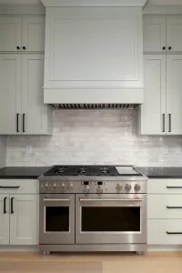 cobble-creek-custom-homes-lakeview-barndominium-kitchen-range-hood-mooresville-nc copy
